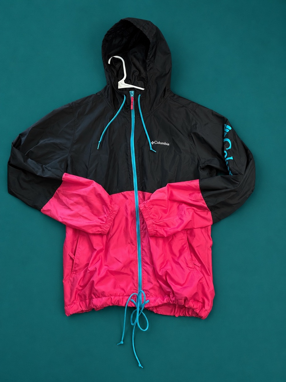 Columbia womens Black and Pink Hooded Rain Jacket with Blue Accents